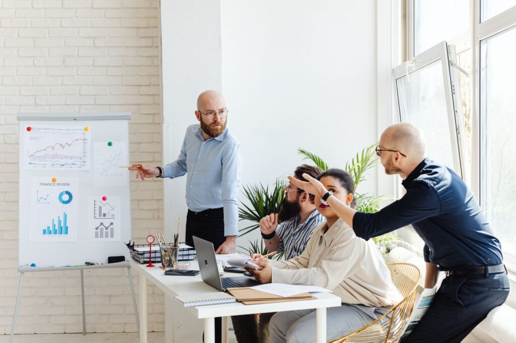 Team presenting revenue growth results to a client